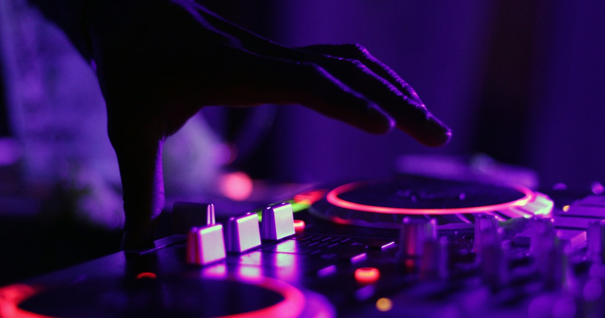 Live music performance with colorful stage lighting